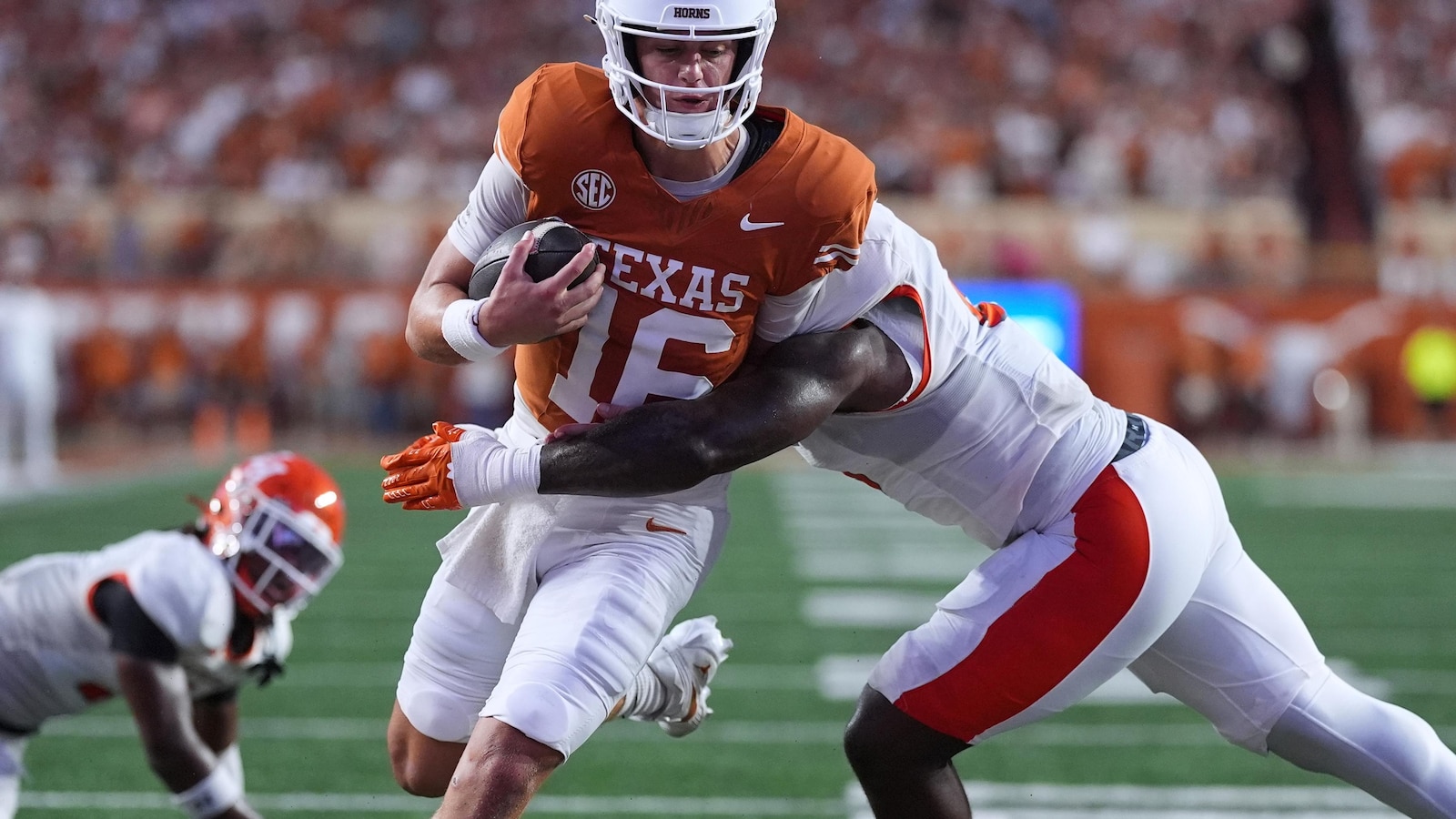 Arch Manning looks sharp with 3 TD passes and No. 8 Texas routs Sam Houston before start of SEC play